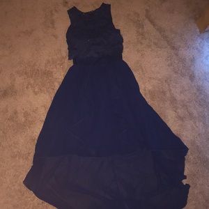 Flowery details on top and flowy at the bottom